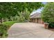 Large backyard with lawn, basketball hoop and three-car garage at 5851 S Colorado Blvd, Greenwood Village, CO 80121