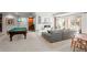 Finished basement with a pool table, cozy seating area, and walkout to the outdoors at 5851 S Colorado Blvd, Greenwood Village, CO 80121