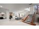 Spacious basement with staircase, pool table, and fireplace, perfect for entertaining at 5851 S Colorado Blvd, Greenwood Village, CO 80121