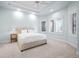 Bright bedroom with a tray ceiling and a large window that fills the room with natural light at 5851 S Colorado Blvd, Greenwood Village, CO 80121