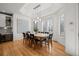 Inviting dining room with hardwood floors, pendant lighting, and large windows at 5851 S Colorado Blvd, Greenwood Village, CO 80121