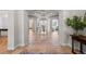 Elegant foyer with tile flooring, a domed ceiling, chandelier and arched doorways at 5851 S Colorado Blvd, Greenwood Village, CO 80121
