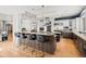Spacious kitchen features a large island with granite countertops, seating, and stainless steel appliances at 5851 S Colorado Blvd, Greenwood Village, CO 80121