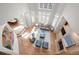 Overhead view of living room featuring a fireplace, large windows, and ample seating at 5851 S Colorado Blvd, Greenwood Village, CO 80121