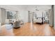 Expansive bedroom with a four-poster bed, seating area, and abundant natural light at 5851 S Colorado Blvd, Greenwood Village, CO 80121