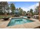 Luxurious pool area with water features and ample seating for relaxation and enjoyment at 5851 S Colorado Blvd, Greenwood Village, CO 80121