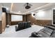 Enjoy movies in this home theater with a large screen, projector, and comfortable seating at 5851 S Colorado Blvd, Greenwood Village, CO 80121