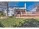 Expansive backyard featuring a spacious deck perfect for entertaining and relaxation at 7926 S Corona Ct, Centennial, CO 80122