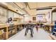 Spacious basement workshop featuring a variety of tools and ample workspace for projects at 7926 S Corona Ct, Centennial, CO 80122