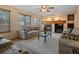 Spacious living room featuring a fireplace and ample natural light at 6460 W 98Th Ct, Westminster, CO 80021