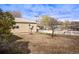 Backyard offers potential for customization and landscaping, with room for gardening or recreation at 2683 E 90Th Pl, Thornton, CO 80229