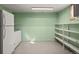 Spacious basement area with shelving units and an additional freezer, perfect for storage at 2683 E 90Th Pl, Thornton, CO 80229