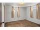 Bedroom with two windows, carpet and neutral walls at 2683 E 90Th Pl, Thornton, CO 80229