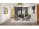 Relaxing living room featuring carpet floors, a modern fireplace and ample seating for entertaining or quiet evenings at 2683 E 90Th Pl, Thornton, CO 80229