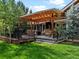 Backyard patio and pergola area, an ideal spot for relaxing and outdoor entertaining at 5884 S Hanover Way, Greenwood Village, CO 80111