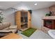 Relaxing basement area with wood sauna, fireplace and cozy leather sofa at 5884 S Hanover Way, Greenwood Village, CO 80111