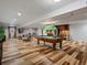 Open concept game room with a pool table and a bar area at 5884 S Hanover Way, Greenwood Village, CO 80111