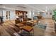 Open concept living room with seating area and game room at 5884 S Hanover Way, Greenwood Village, CO 80111