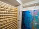 Versatile storage room with wine rack and abstract art providing function and flair at 5884 S Hanover Way, Greenwood Village, CO 80111