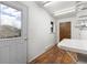 Mud room with durable wood floors, natural light, and ample counter space at 26063 Morris Ave, Conifer, CO 80433