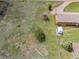 Aerial view showcasing the expansive yard, utility shed, and peaceful surroundings at 26063 Morris Ave, Conifer, CO 80433