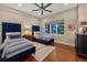 Bedroom with hardwood floors, two beds, and a window showcasing a scenic view at 814 Neville Ln, Golden, CO 80401