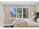 Bedroom featuring a picturesque mountain view through a large window at 814 Neville Ln, Golden, CO 80401
