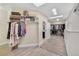 Spacious walk-in closet with custom shelving, drawers, and an island for organization at 814 Neville Ln, Golden, CO 80401