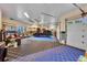 Spacious garage with an assortment of tools and multiple garage doors at 814 Neville Ln, Golden, CO 80401