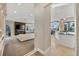 Open-concept living room with fireplace and access to the kitchen and outdoor spaces at 814 Neville Ln, Golden, CO 80401