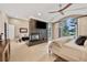 Spacious main bedroom with fireplace, TV, sitting area, and scenic views at 814 Neville Ln, Golden, CO 80401
