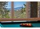 The recreation room has a billiard table with mountain views at 814 Neville Ln, Golden, CO 80401