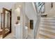 The home features a bar, wine cellar, and a modern staircase with metal railings at 814 Neville Ln, Golden, CO 80401