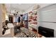 A large walk-in closet features custom shelving and a Zebra rug at 814 Neville Ln, Golden, CO 80401