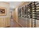 Wine cellar with natural wood, showcasing extensive wine storage at 814 Neville Ln, Golden, CO 80401