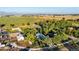 Aerial view of property showcasing main house, outbuildings, and surrounding landscape at 10876 Maple Rd, Lafayette, CO 80026