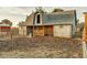 Functional barn with stalls and large storage space, ideal for various uses at 10876 Maple Rd, Lafayette, CO 80026