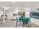Basement game area with wet bar and a small dining table at 10876 Maple Rd, Lafayette, CO 80026
