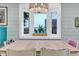 Dining area with bay window and a view, featuring a rustic wooden table at 10876 Maple Rd, Lafayette, CO 80026