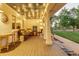 Inviting front porch with string lights and comfortable seating at 10876 Maple Rd, Lafayette, CO 80026