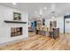 Modern kitchen with white cabinets, island, and stainless steel appliances at 10876 Maple Rd, Lafayette, CO 80026