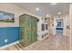 Laundry room with washer, dryer, and antique storage cabinet at 10876 Maple Rd, Lafayette, CO 80026