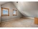 Cozy bedroom featuring neutral walls, soft carpeting, bright windows with stunning view, and a serene retreat for rest and relaxation at 5351 Tall Horse Trl, Sedalia, CO 80135
