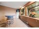 Unique table area with seating, refrigerator, and an amazing view of the barn at 5351 Tall Horse Trl, Sedalia, CO 80135