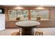 Enjoy barn views from this unique table area, complete with a refrigerator and seating at 5351 Tall Horse Trl, Sedalia, CO 80135