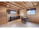 Cozy eat-in kitchen with beautiful wood walls, cabinets and floors at 5351 Tall Horse Trl, Sedalia, CO 80135