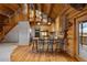 Charming kitchen with wooden cabinets, stainless steel appliances, and a rustic breakfast bar at 5351 Tall Horse Trl, Sedalia, CO 80135