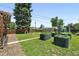 Backyard has beautiful gardening beds to grow your own herbs and vegetables at 1240 Ulster St, Denver, CO 80220