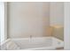 Luxurious bathroom features a soaking tub with elegant fixtures and stylish tile work at 35 S Forest St, Denver, CO 80246