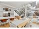 Open concept dining area featuring stylish decor, staircase and natural light at 35 S Forest St, Denver, CO 80246